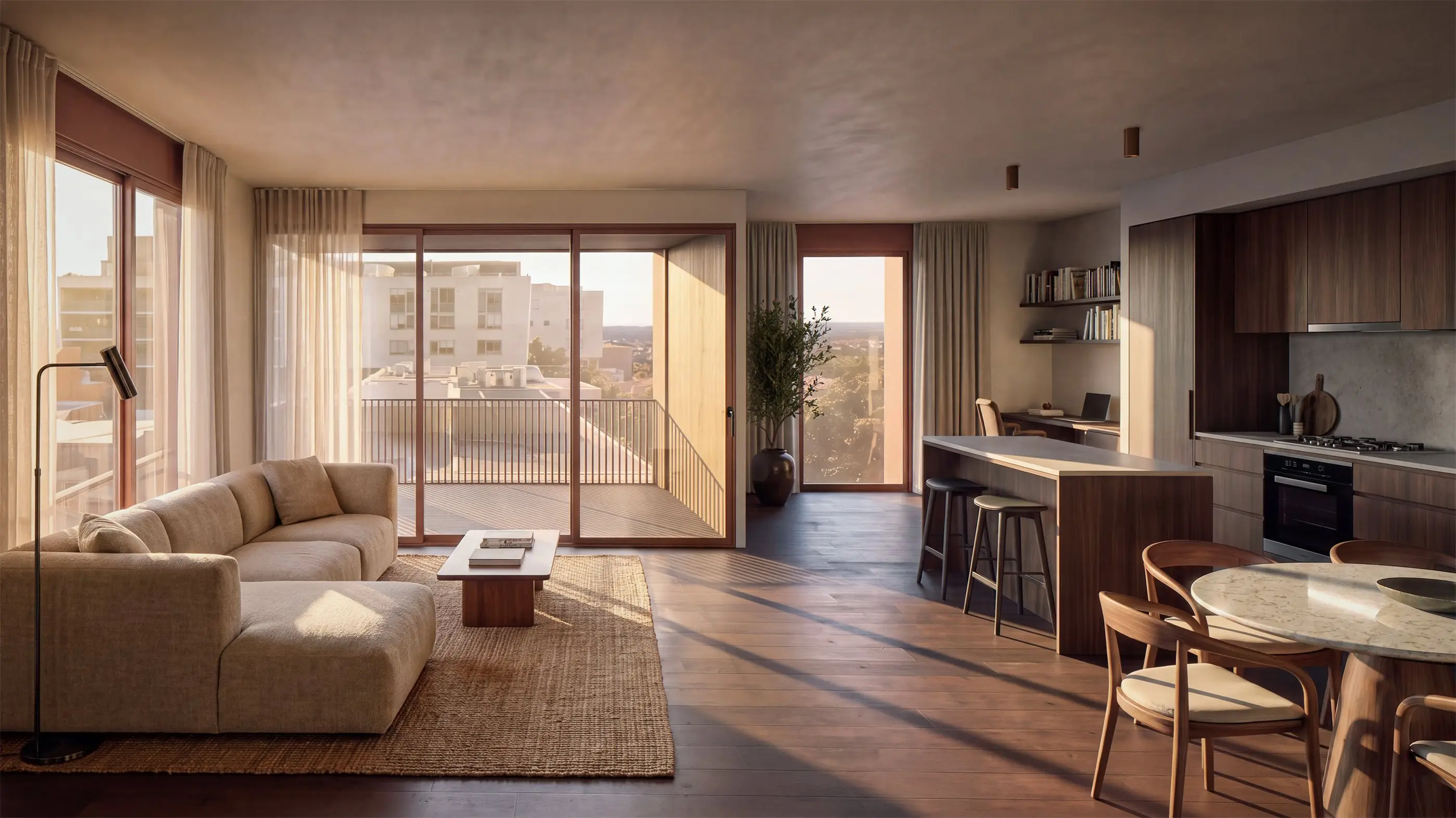 Open living, dining and kitchen of a Five Dock apartment in late afternoon light, timber flooring and dark joinery with a stone island bench, jute rug, and sliding doors to a battened balcony.